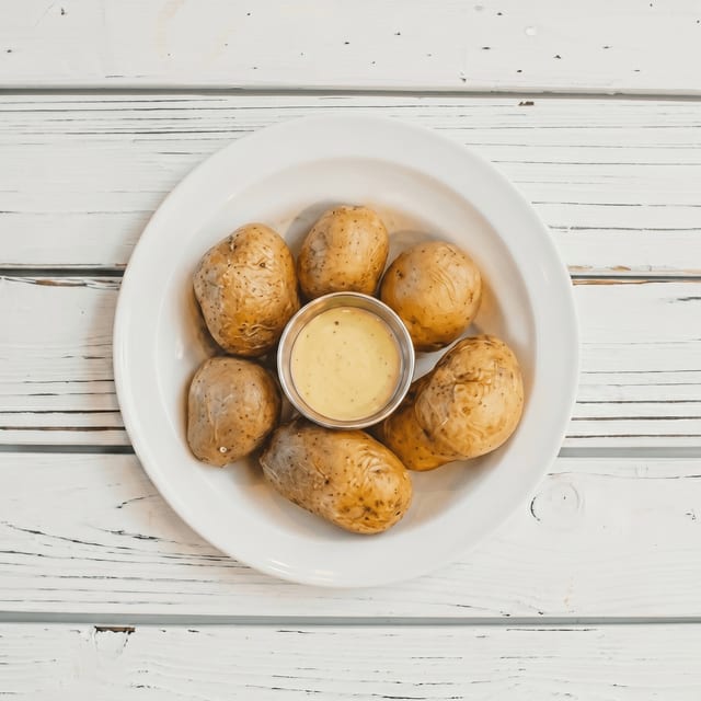 Boil Potatoes.